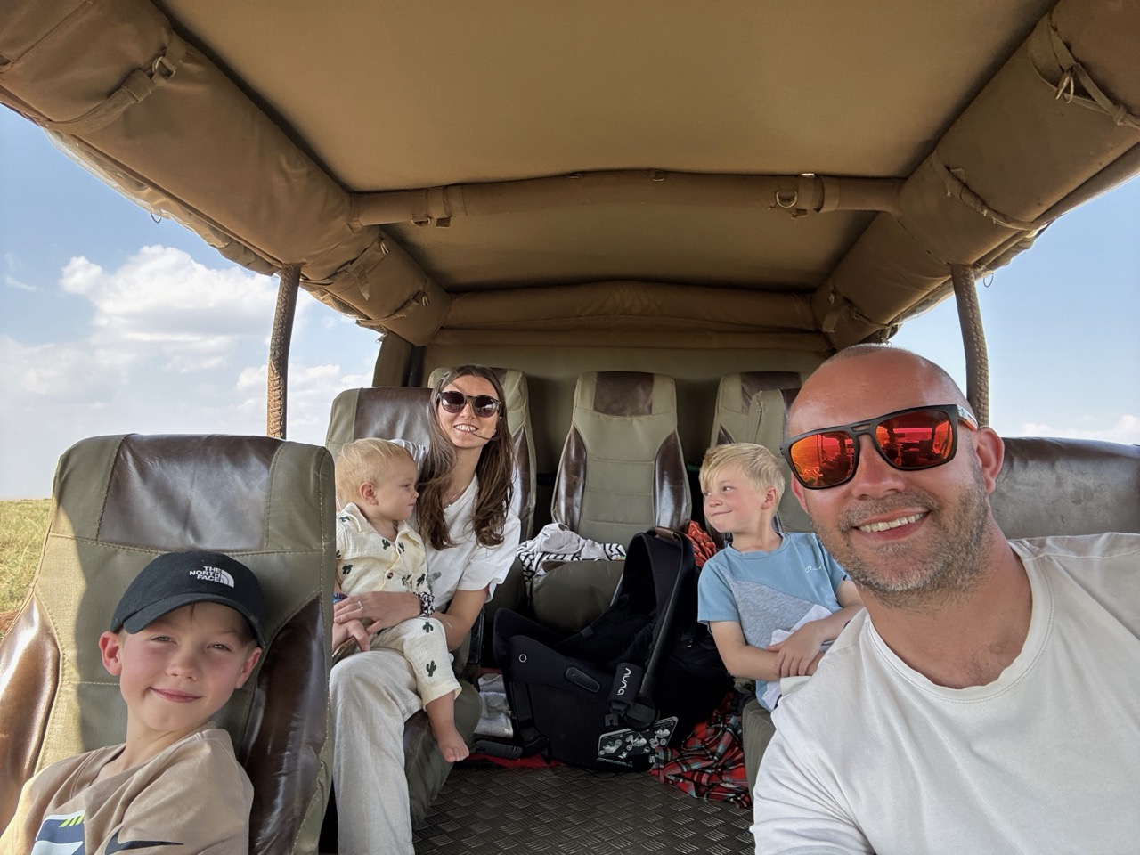 The Carew family on safari - James, Liberty, Noah, Johannes and Alexander in a safari jeep